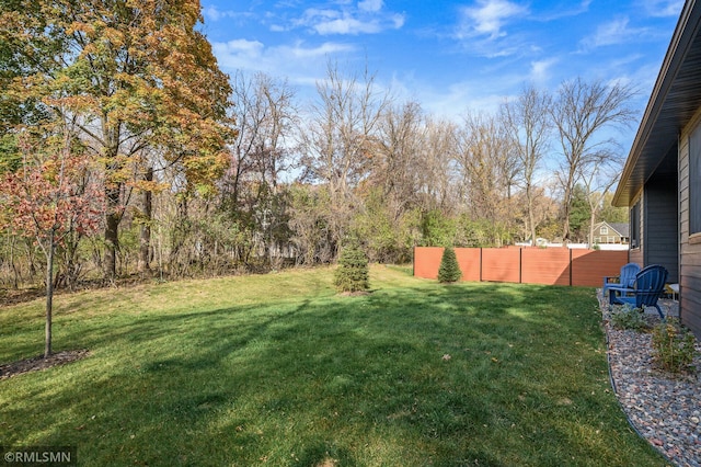 view of yard featuring fence