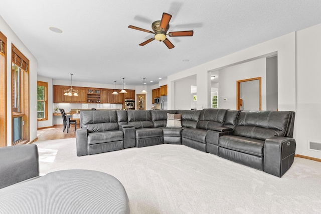 17397 73rd Pl N, Maple Grove, MN 55311 - living area featuring ceiling fan and light carpet