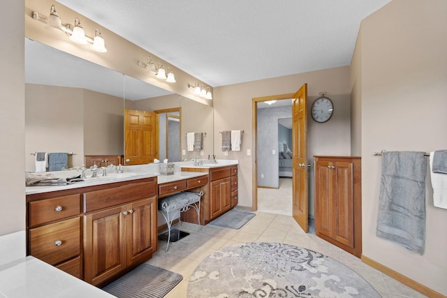 17397 73rd Pl N, Maple Grove, MN 55311 - bathroom featuring double vanity and tile patterned flooring