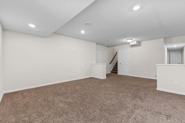 17397 73rd Pl N, Maple Grove, MN 55311 - finished basement with a textured ceiling, carpet, recessed lighting, and stairs