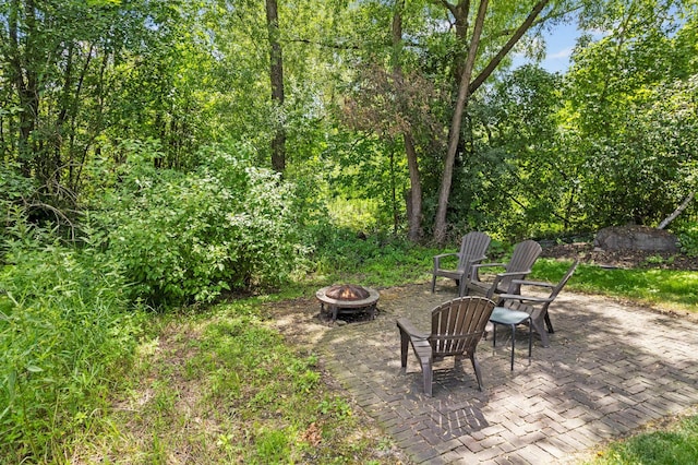 17397 73rd Pl N, Maple Grove, MN 55311 - view of yard with an outdoor fire pit and a patio area