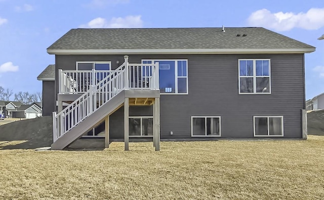 941 Whiskey Rd NW, Isanti, MN 55040 - back of property featuring stairway, a yard, and roof with shingles