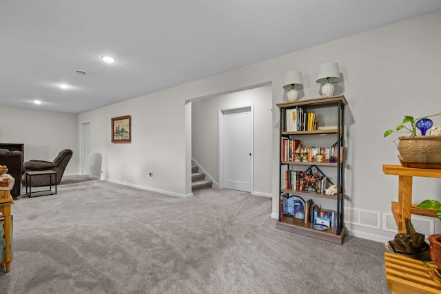 941 Whiskey Rd NW, Isanti, MN 55040 - living area with stairway, carpet floors, recessed lighting, and baseboards