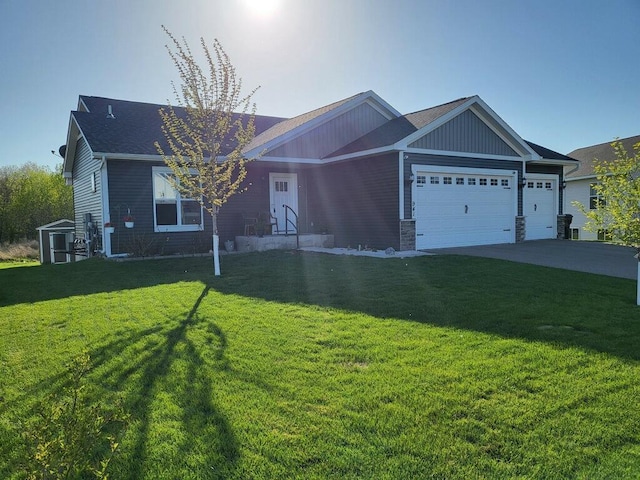 941 Whiskey Rd NW, Isanti, MN 55040 - view of front facade featuring an attached garage, a front yard, and concrete driveway