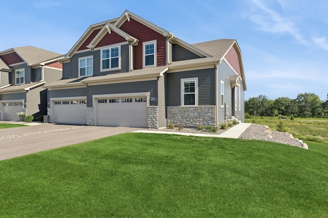 6767 Bluestem Way, Minnetrista, MN 55331 - craftsman house with an attached garage, concrete driveway, stone siding, a front yard, and a shingled roof