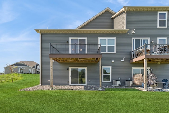 6767 Bluestem Way, Minnetrista, MN 55331 - back of property with a lawn and a balcony