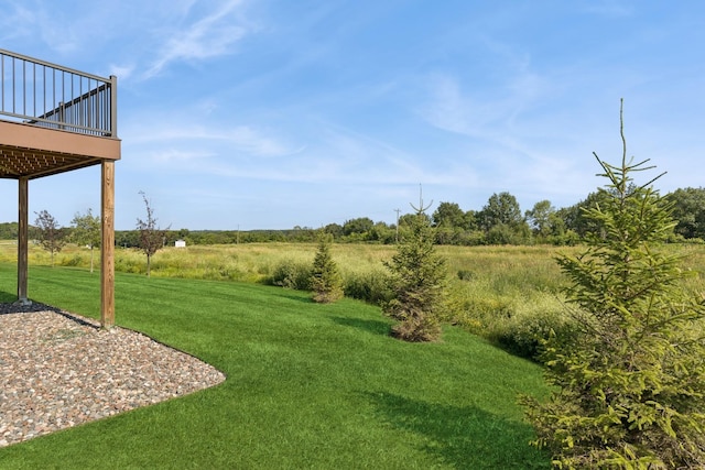 6767 Bluestem Way, Minnetrista, MN 55331 - view of grassy yard featuring a deck