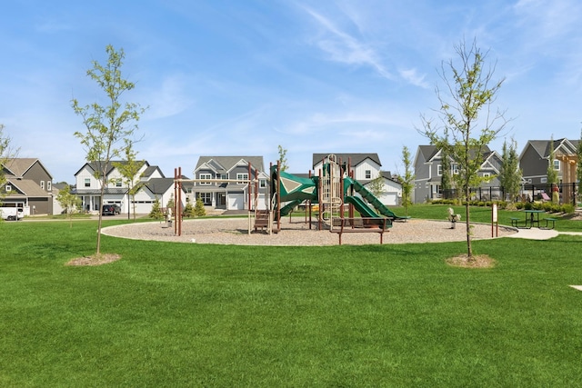 6767 Bluestem Way, Minnetrista, MN 55331 - community play area featuring a residential view and a lawn