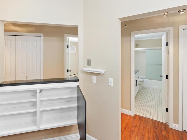 7605 Edinborough Way Unit 6314, Edina, MN 55435 - hall with baseboards and wood finished floors