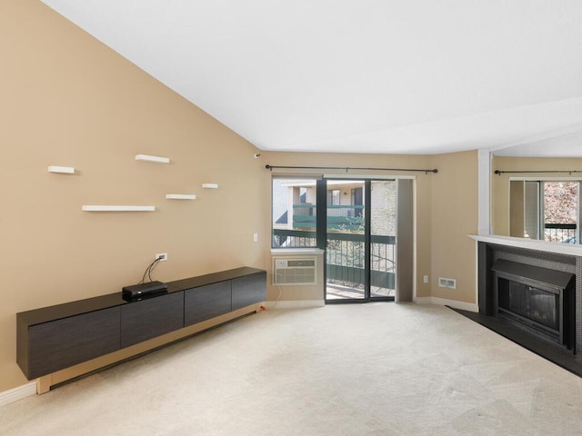 7605 Edinborough Way Unit 6314, Edina, MN 55435 - unfurnished living room featuring carpet floors, baseboards, a fireplace with flush hearth, and a wall unit AC