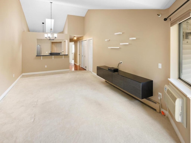 7605 Edinborough Way Unit 6314, Edina, MN 55435 - unfurnished living room with light carpet, a wall mounted air conditioner, a chandelier, baseboards, and lofted ceiling