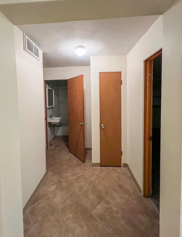 302 Elmwood St, Arlington, MN 55307 - hallway featuring baseboards