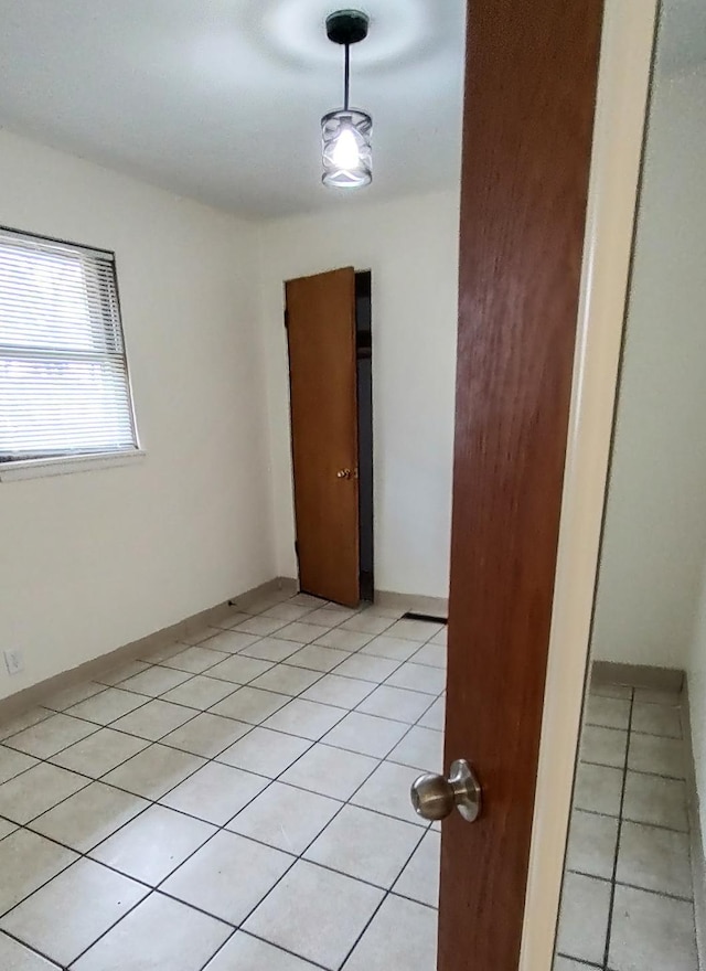 302 Elmwood St, Arlington, MN 55307 - spare room featuring light tile patterned flooring