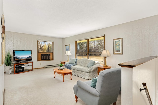 carpeted living room featuring a baseboard radiator