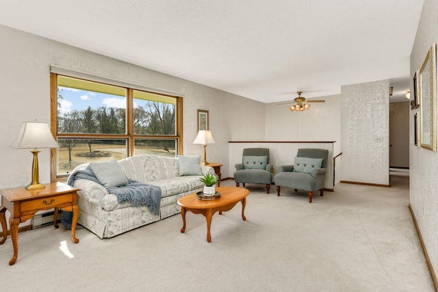 carpeted living room featuring a ceiling fan