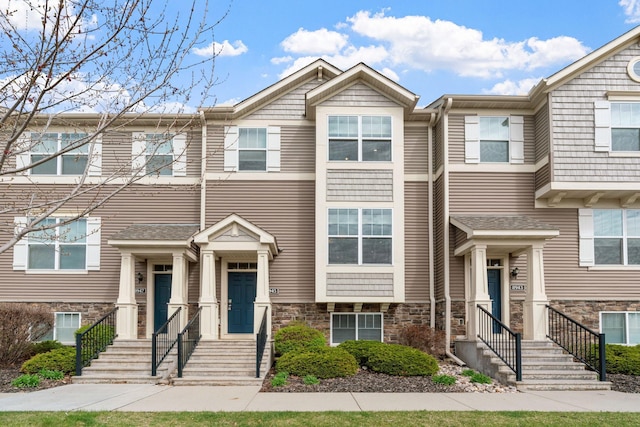 8945 Village Loop, Chanhassen, MN 55317 - townhome / multi-family property with stone siding