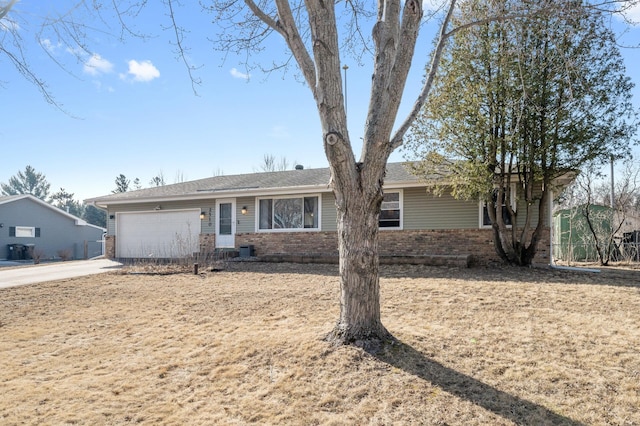 2510 152nd Ln NE, Ham Lake, MN 55304 - single story home featuring driveway, brick siding, and an attached garage