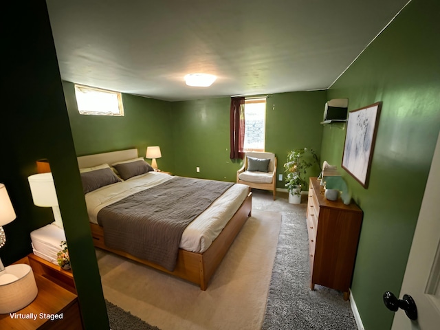 10855 150th St NE, Spicer, MN 56288 - carpeted bedroom featuring multiple windows and baseboards