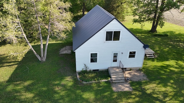 10855 150th St NE, Spicer, MN 56288 - rear view of property featuring a lawn