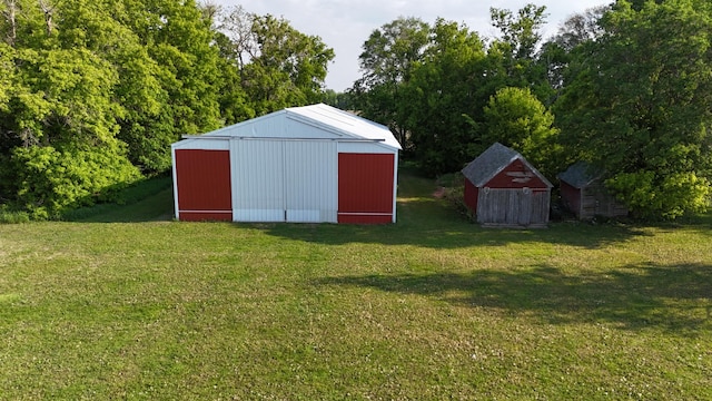 10855 150th St NE, Spicer, MN 56288 - view of pole building with a yard and a storage unit