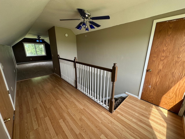 10855 150th St NE, Spicer, MN 56288 - bonus room with wood finished floors, a ceiling fan, vaulted ceiling, and baseboards