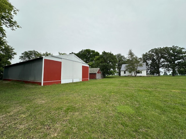 10855 150th St NE, Spicer, MN 56288 - view of grassy yard with an outbuilding and an outdoor structure