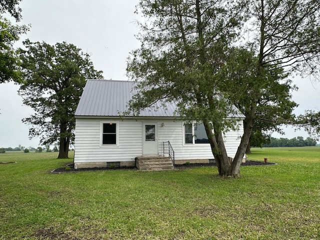 10855 150th St NE, Spicer, MN 56288 - back of property with a yard and metal roof