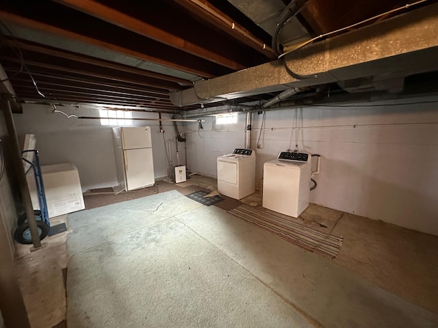 10855 150th St NE, Spicer, MN 56288 - below grade area featuring freestanding refrigerator and washer and dryer