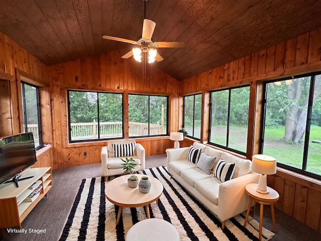 6480 Long Lake Rd, Willmar, MN 56201 - living area featuring vaulted ceiling, carpet flooring, wood ceiling, wood walls, and a ceiling fan