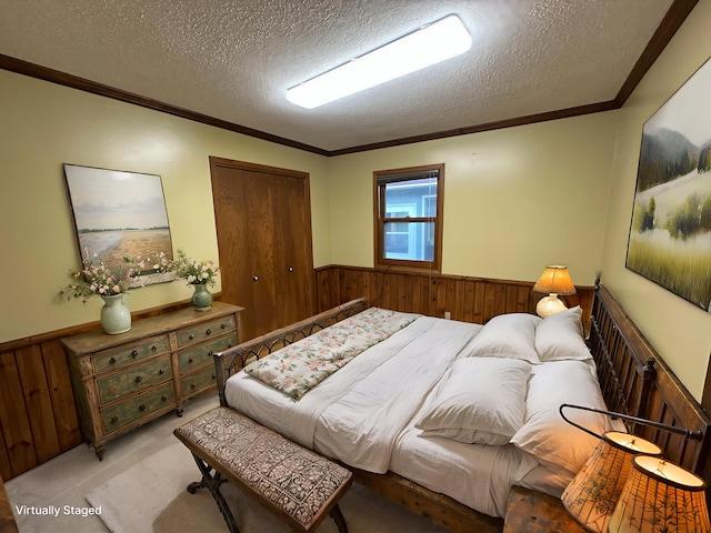 6480 Long Lake Rd, Willmar, MN 56201 - carpeted bedroom featuring a wainscoted wall, a textured ceiling, wood walls, crown molding, and a closet