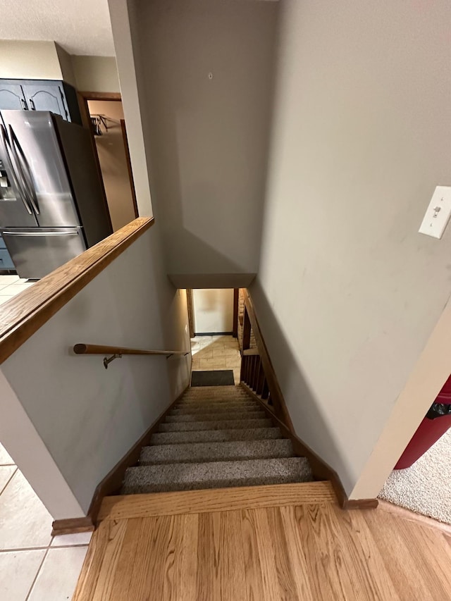 6480 Long Lake Rd, Willmar, MN 56201 - stairway featuring baseboards