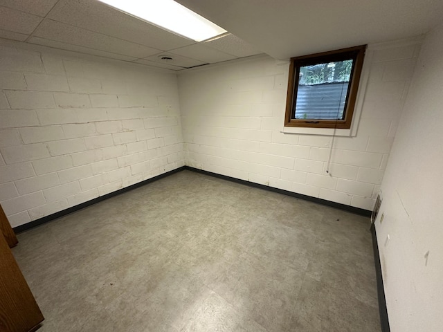 6480 Long Lake Rd, Willmar, MN 56201 - empty room with concrete block wall and a drop ceiling