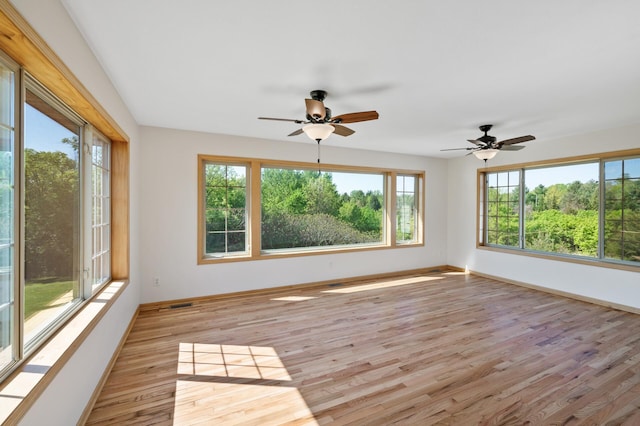 33373 Lakes Trl, Chisago Lake Twp, MN 55045 - unfurnished sunroom featuring plenty of natural light