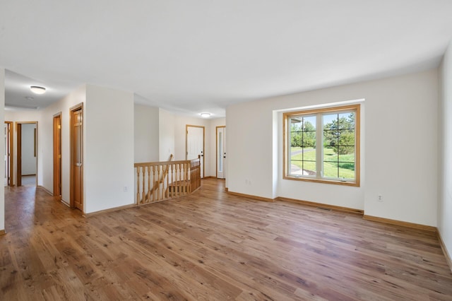 33373 Lakes Trl, Chisago Lake Twp, MN 55045 - empty room featuring light wood-style floors and baseboards