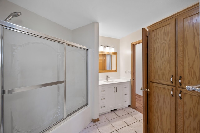 33373 Lakes Trl, Chisago Lake Twp, MN 55045 - bathroom with tile patterned floors, vanity, and bath / shower combo with glass door