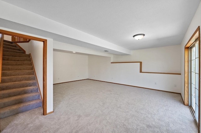 33373 Lakes Trl, Chisago Lake Twp, MN 55045 - basement featuring carpet, stairs, and baseboards