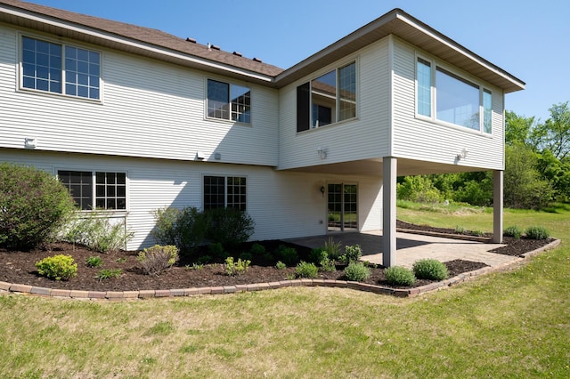 33373 Lakes Trl, Chisago Lake Twp, MN 55045 - rear view of property featuring a patio and a yard