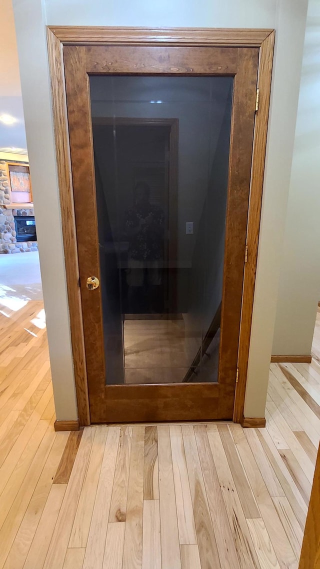 1404 19th Ave NW, Faribault, MN 55021 - detailed view of wood finished floors and baseboards