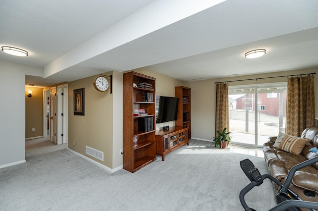 4846 Lionhart Dr NW, Rochester, MN 55901 - living room featuring visible vents, light carpet, and baseboards