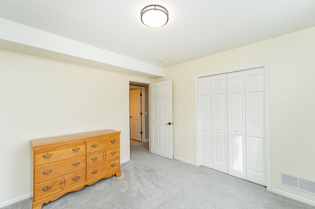 4846 Lionhart Dr NW, Rochester, MN 55901 - bedroom featuring visible vents, baseboards, light colored carpet, and a closet