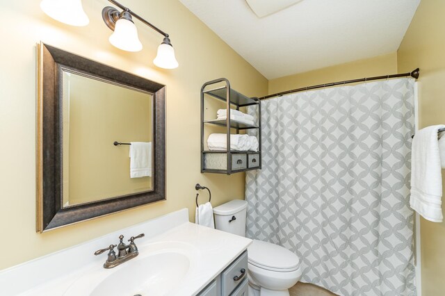4846 Lionhart Dr NW, Rochester, MN 55901 - bathroom with a shower with curtain, toilet, and vanity