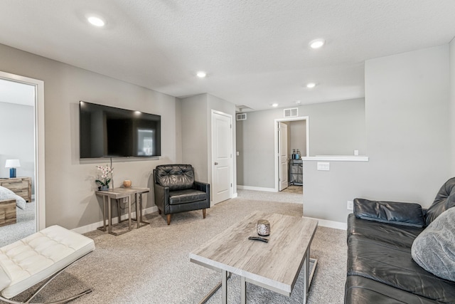 12972 Bauer Dr N, Champlin, MN 55316 - living room featuring light carpet, baseboards, and recessed lighting