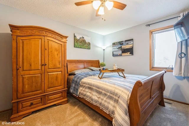 3040 Shields Dr Unit 102, Eagan, MN 55121 - carpeted bedroom with a textured ceiling, ceiling fan, and baseboards