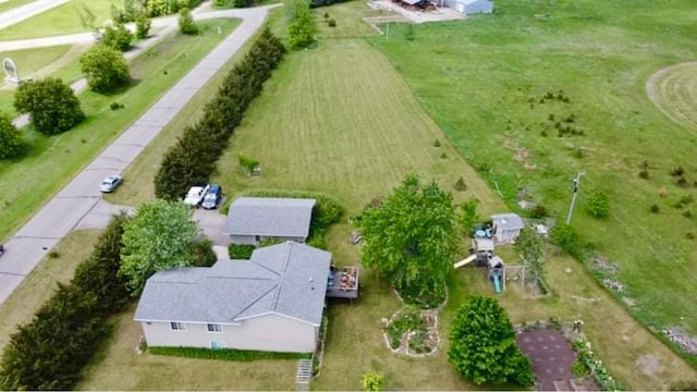 birds eye view of property featuring a rural view