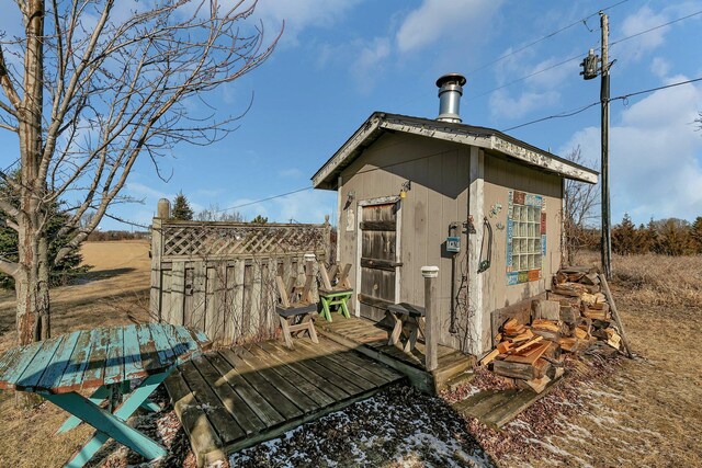 view of outbuilding with an outdoor structure