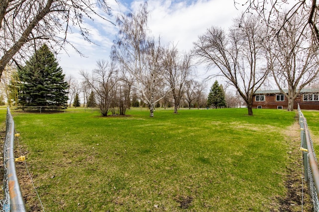 301 3rd Ave S, Borup, MN 56519 - view of yard featuring fence