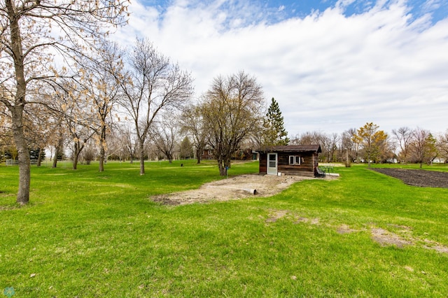 301 3rd Ave S, Borup, MN 56519 - view of yard featuring an outdoor structure