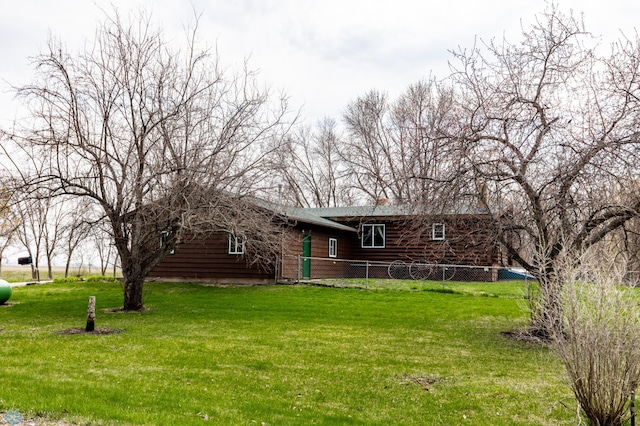 301 3rd Ave S, Borup, MN 56519 - exterior space featuring fence and a front yard