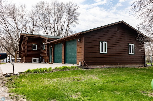 301 3rd Ave S, Borup, MN 56519 - view of side of property featuring a lawn, an attached garage, driveway, and log exterior