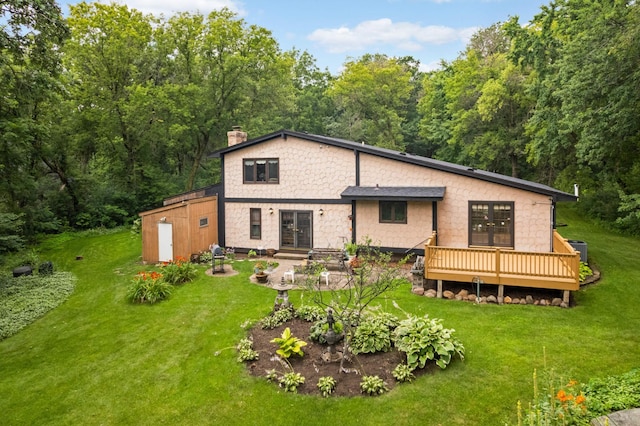 5853 Deer Trail Cir, Woodbury, MN 55129 - back of property featuring french doors, a wooden deck, a yard, and a chimney